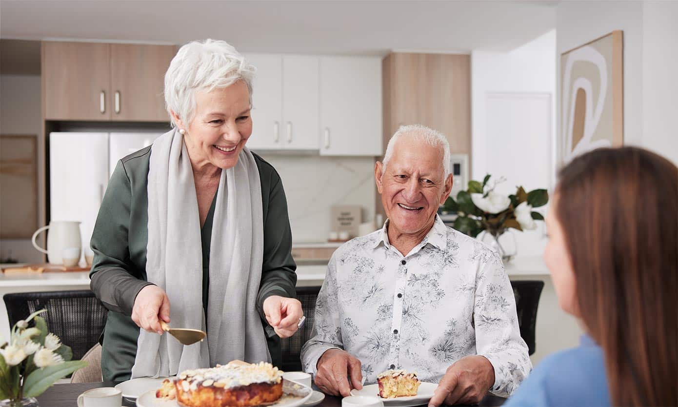 St Quentin Place - people enjoying a slice of cake and our fantastic lifestyle